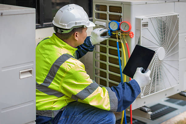 Professional Heat Pump Repair technician working in Wellford, SC